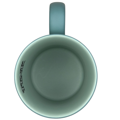 Inside view of Tinker Bell Tink 5 Poses Disneyland Mug with a soft blue interior and logo
