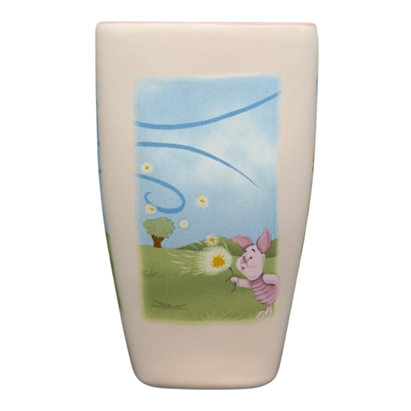 Disneyland Winnie the Pooh Make A Wish vintage mug featuring Piglet in a grassy field with dandelions