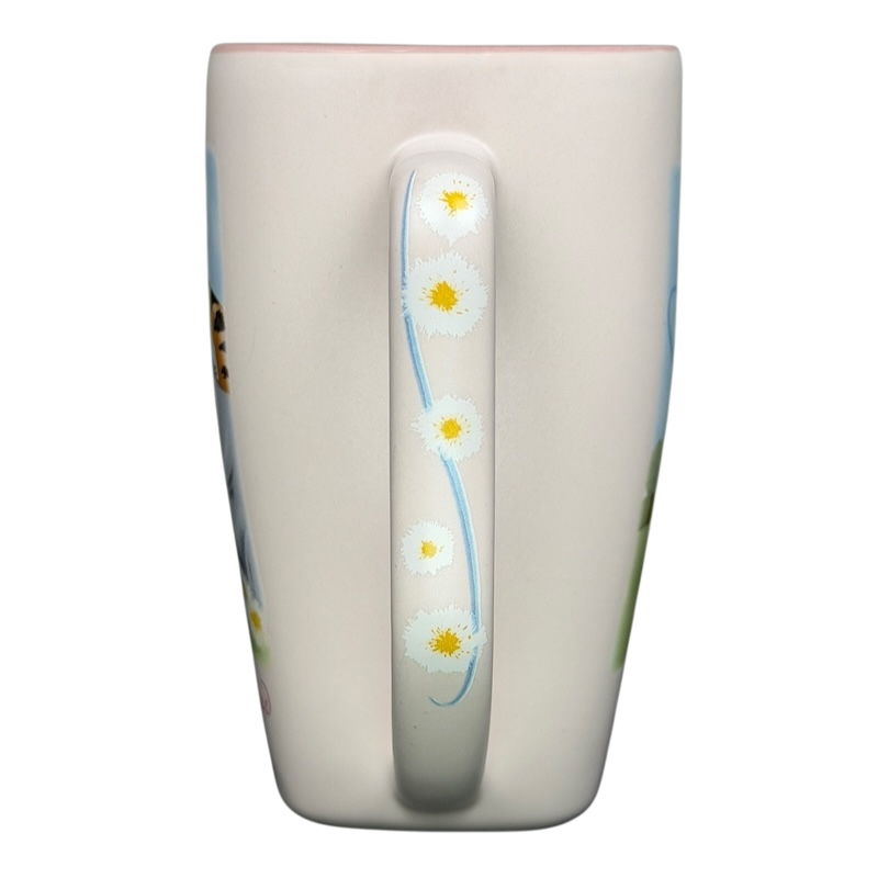 Disneyland Winnie the Pooh Make A Wish vintage mug showcasing whimsical designs and a cheerful handle