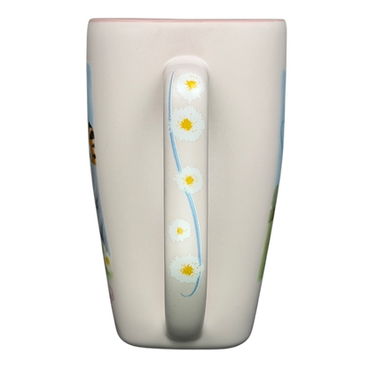 Disneyland Winnie the Pooh Make A Wish vintage mug showcasing whimsical designs and a cheerful handle
