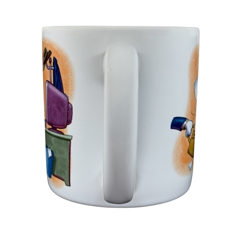 Disney Clock Watcher vintage Donald Duck mug showing side handle and colorful cartoon design