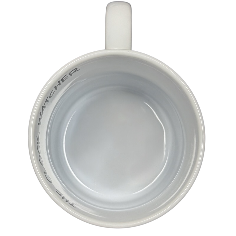 Top view of Disney Clock Watcher vintage Donald Duck mug in white ceramic with gray text inside rim