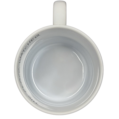 Top view of Disney Clock Watcher vintage Donald Duck mug in white ceramic with gray text inside rim