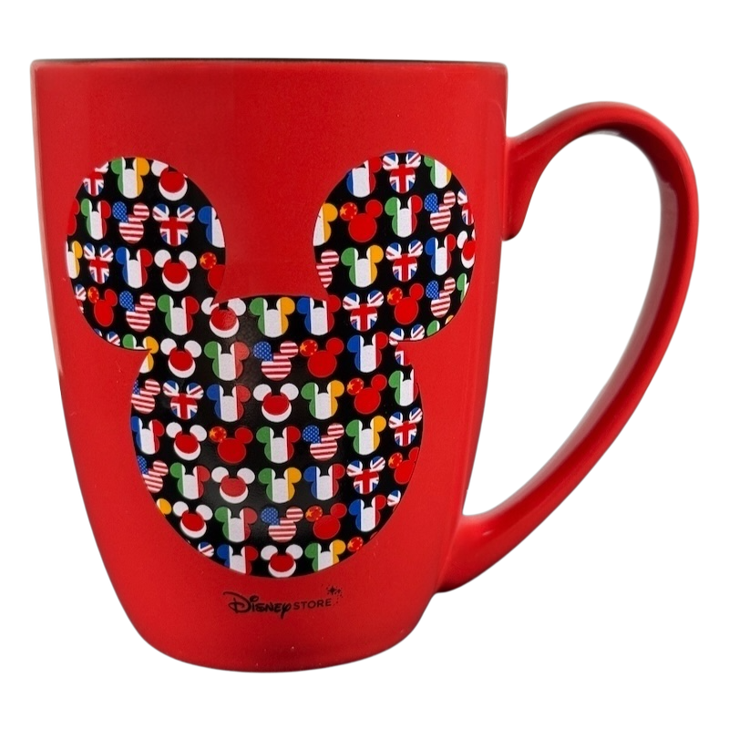 Disney Mickey Mouse Magic Around The World vintage mug with colorful flag pattern on red ceramic