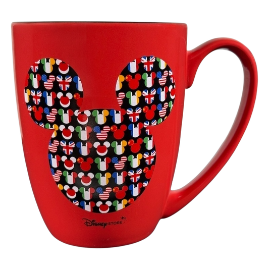 Disney Mickey Mouse Magic Around The World vintage mug with colorful flag pattern on red ceramic