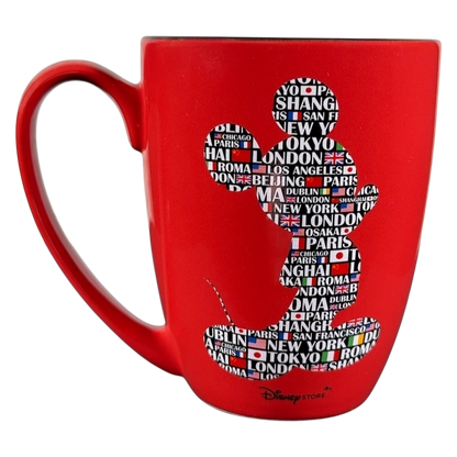Red Disney Mickey Mouse Magic Around The World vintage mug with city names and flags silhouette design