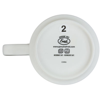 Bottom view of a Fred draggin vintage pug dog mug with care instructions and design details