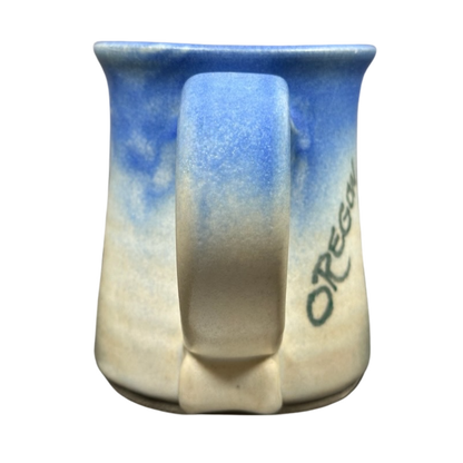 Dulcie Lindsoe-Johansen Mt. Hood pottery mug in blue and beige with Oregon inscription