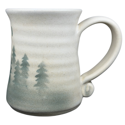 Dulcie Lindsoe-Johansen Oregon pine pottery mug featuring a forest design and a comfortable handle