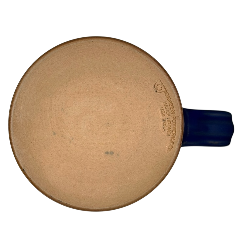 Bottom view of East Shore Lodging Deneen mug Lake Wallenpaupack with signature and blue handle