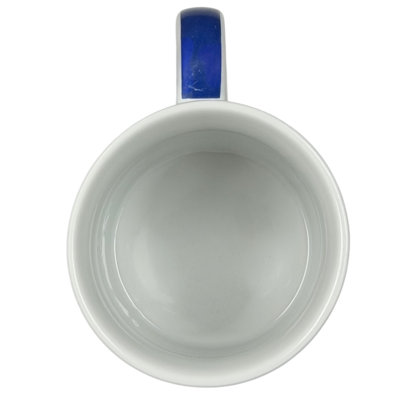 Eddie Bauer countryside picnic mug in white with a blue handle, perfect for outdoor gatherings