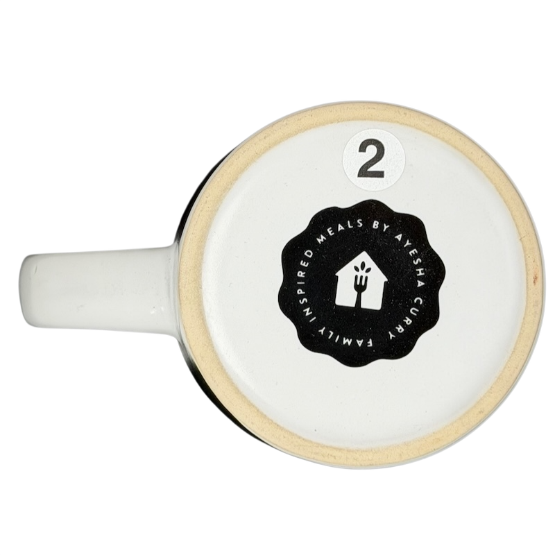 Bottom view of the Coming In Hot FabFitFun Mug Ayesha Curry with logo and number two design