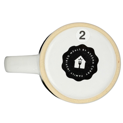 Bottom view of the Coming In Hot FabFitFun Mug Ayesha Curry with logo and number two design