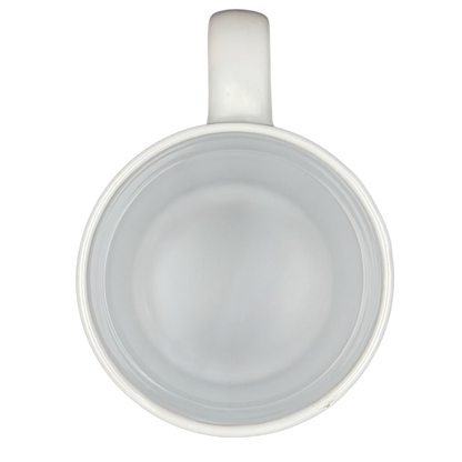 Top view of a white ceramic Coming In Hot FabFitFun Mug Ayesha Curry with a smooth interior finish