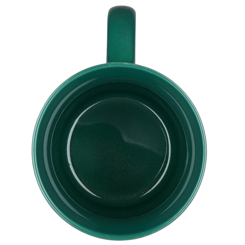Top view of a green ceramic Far Side Santa closet vintage mug by Andrews McMeel Publishing