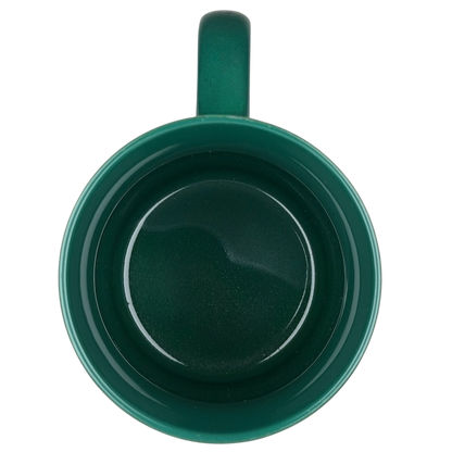 Top view of a green ceramic Far Side Santa closet vintage mug by Andrews McMeel Publishing