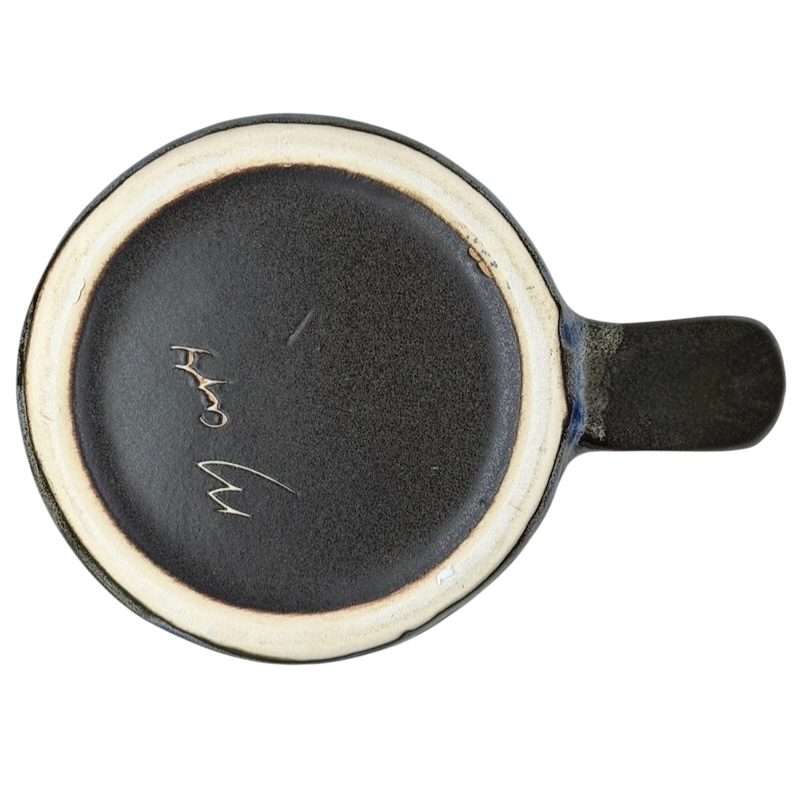 Bottom view of the Five Fish Mara Mexico mug showcasing its unique ceramic finish and craftsmanship.