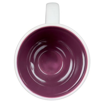 Floral Cat Silhouette Coffee Mug with a glossy white exterior and a deep purple interior