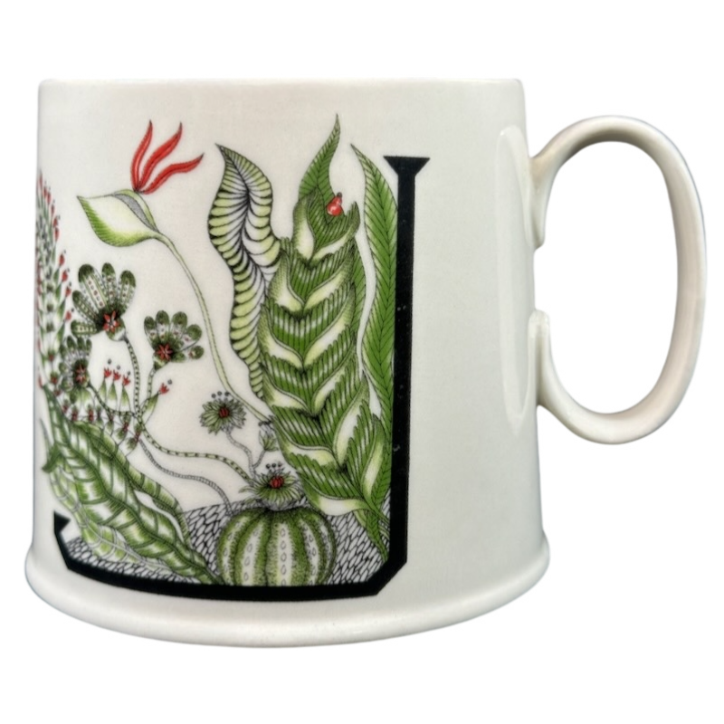 Florence Balducci Botanical Monogram Initial Mug Anthropologie featuring lush green foliage and vibrant accents