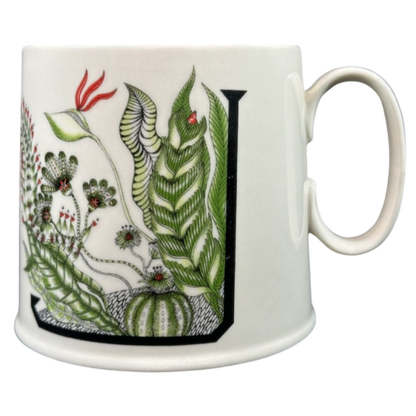 Florence Balducci Botanical Monogram Initial Mug Anthropologie featuring lush green foliage and vibrant accents