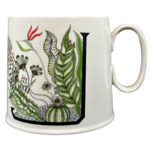 Florence Balducci Botanical Monogram Initial Mug Anthropologie featuring lush green foliage and vibrant accents