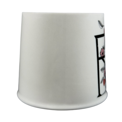 Florence Balducci monogram mug featuring a classic design with decorative floral accents