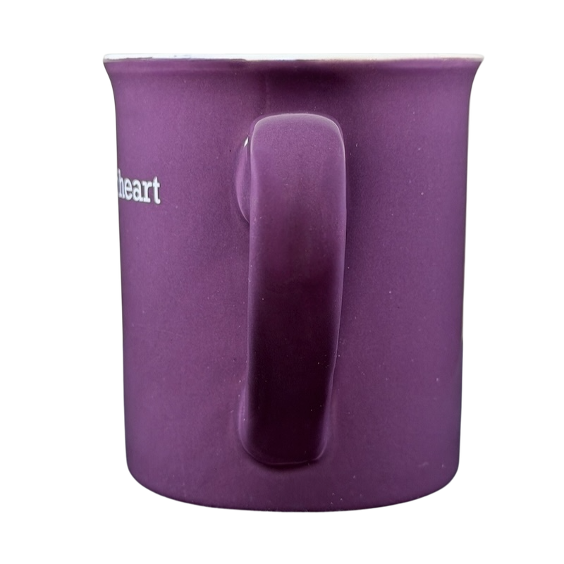 Follow Your Heart collectible THL purple mug with a smooth handle and glossy finish