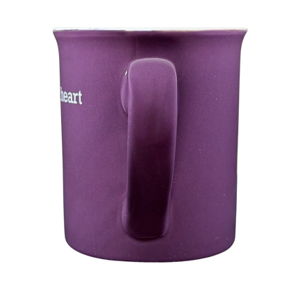 Follow Your Heart collectible THL purple mug with a smooth handle and glossy finish