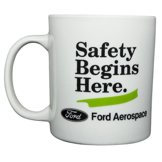 Ford Aerospace vintage mug featuring the phrase Safety Begins Here and classic branding