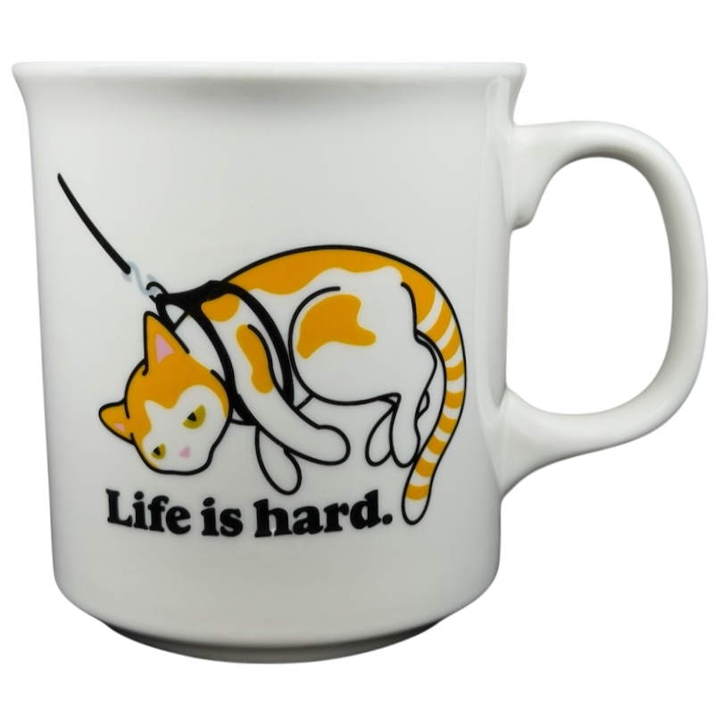 Life is Hard Orange Tabby Cat Mug Fred featuring a playful cat design and humorous text