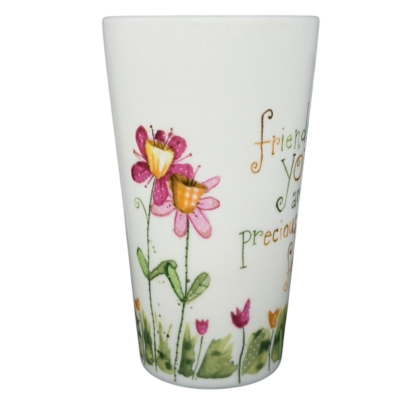 Friends Like You Are Precious mug with a floral design and colorful artwork