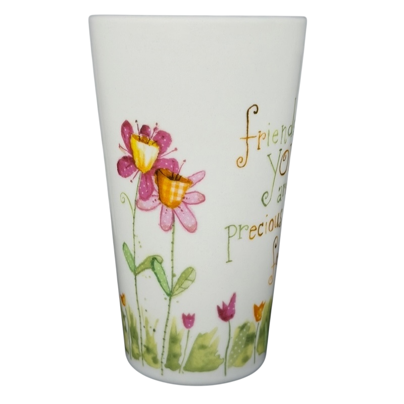 Colorful Friends Like You Are Precious mug with floral design and inspirational text