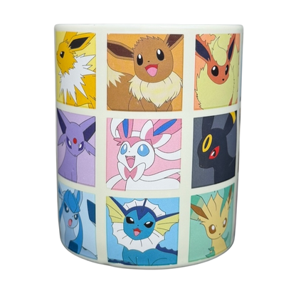 Eevee & Eeveelutions Grid Mug Game Freak featuring various Eevee evolutions in colorful artwork