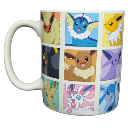 Eevee & Eeveelutions Grid Mug Game Freak featuring vibrant character designs of Eevee and its evolutions