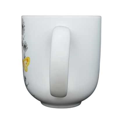 Geninne's Art butterflies mug featuring vibrant butterfly design and floral accents