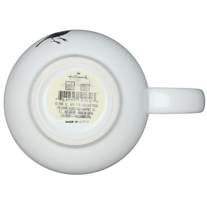 Bottom view of Hallmark Geninne's Art floral bird mug showcasing the brand label and design details