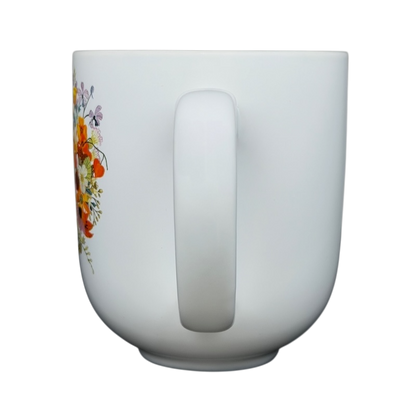 Geninne's Art floral bird mug featuring vibrant flowers and a smooth handle for comfortable sipping