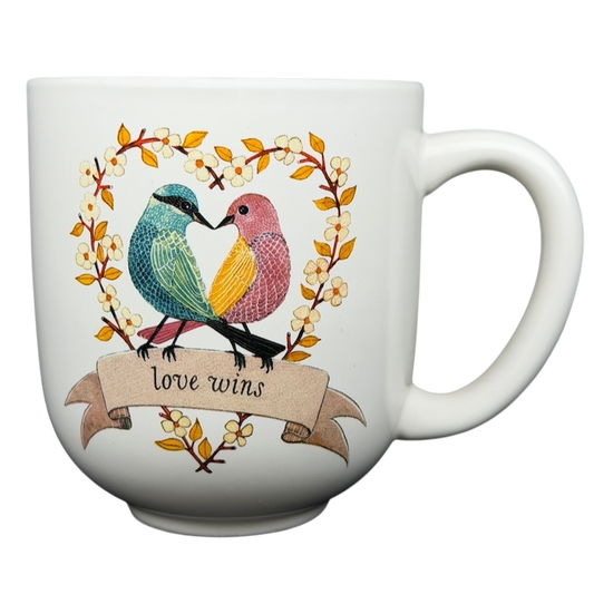 Geninne's Art Love Wins mug featuring colorful birds and floral design celebrating love