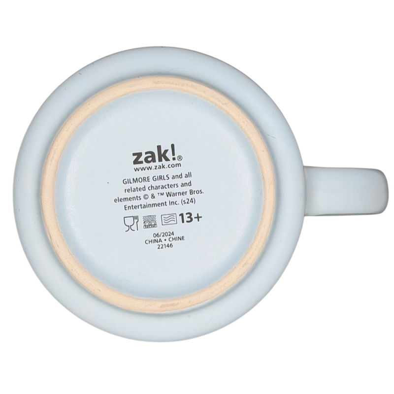 Bottom view of the Zak! Designs Gilmore Girls Lukes Diner Mug with logo and care instructions
