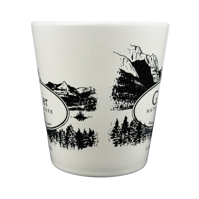 Glacier National Park mug featuring scenic mountain and forest designs in black and white