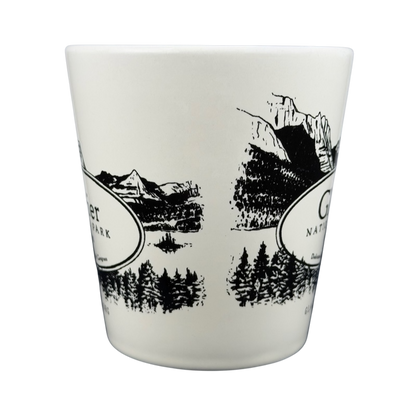 Glacier National Park mug featuring scenic mountain and forest designs in black and white