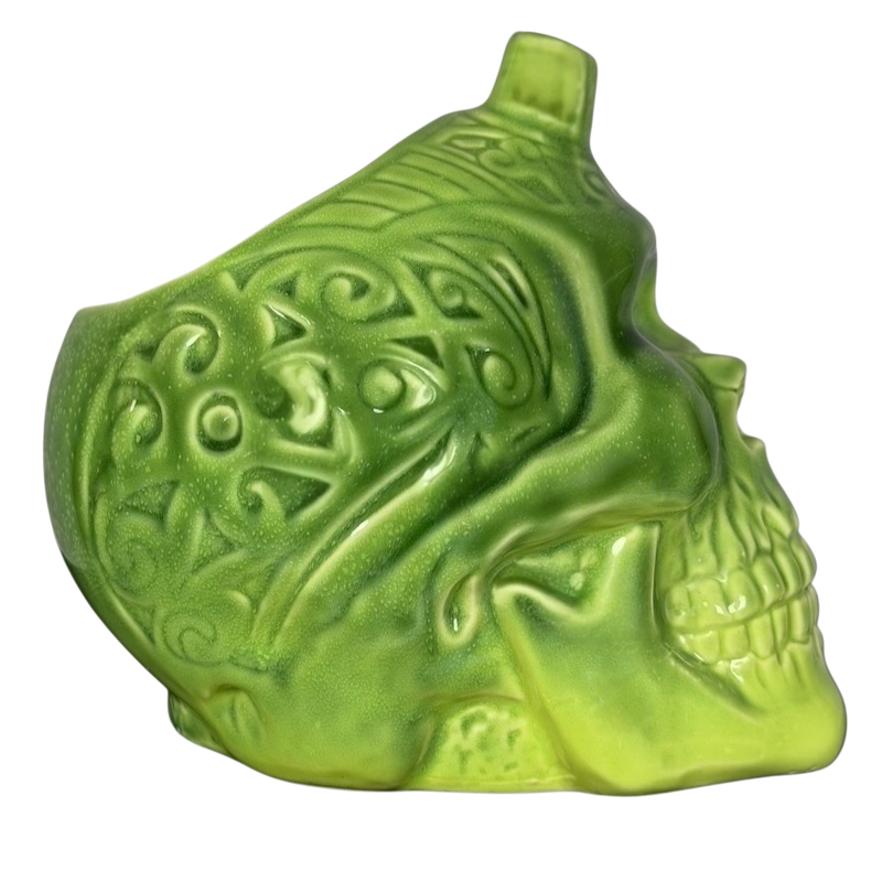 Golden Tiki Las Vegas mug in vibrant green with intricate skull design and detailing
