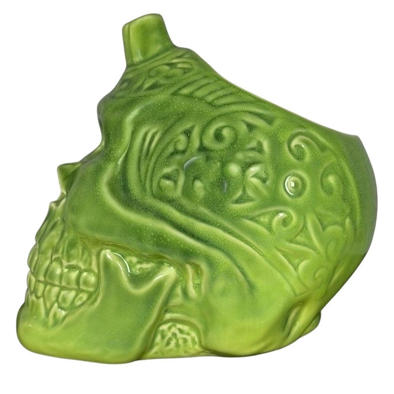 Golden Tiki Las Vegas mug in green skull design with intricate etched patterns