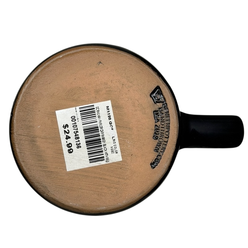 Bottom view of a Grand Canyon Railway Deneen Pottery collectible mug showing the unique glaze and marking