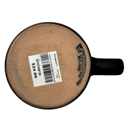 Bottom view of a Grand Canyon Railway Deneen Pottery collectible mug showing the unique glaze and marking