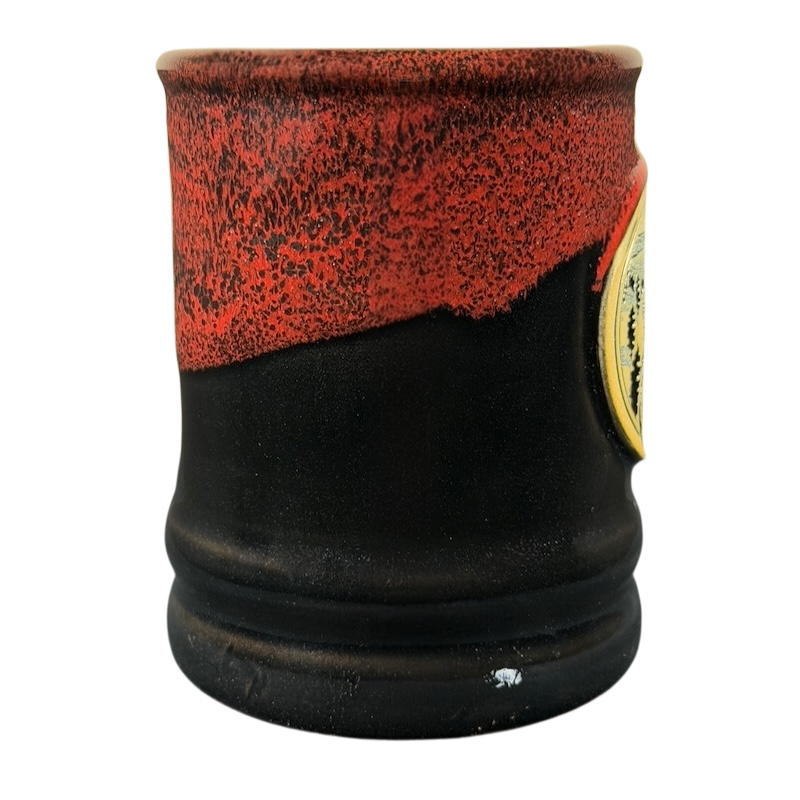 Grand Canyon Railway Deneen Pottery collectible mug featuring a striking black and red design.