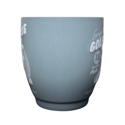 Grumpy’s Golf Course mug Disney Store featuring a matte grey finish and whimsical designs