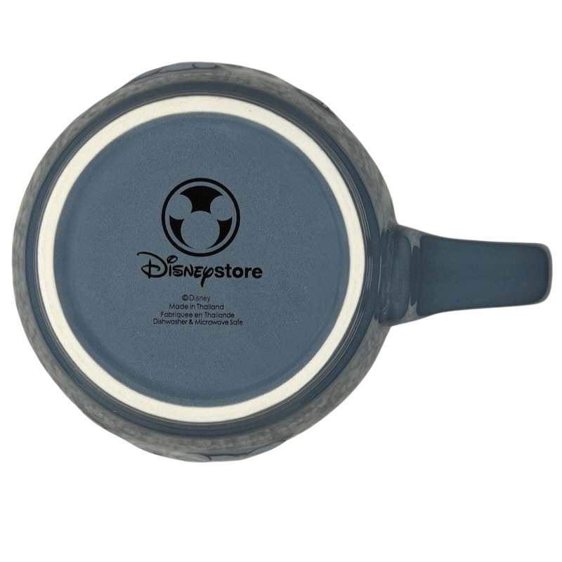Top view of Grumpy’s Golf Course mug Disney Store with a blue handle and logo detail
