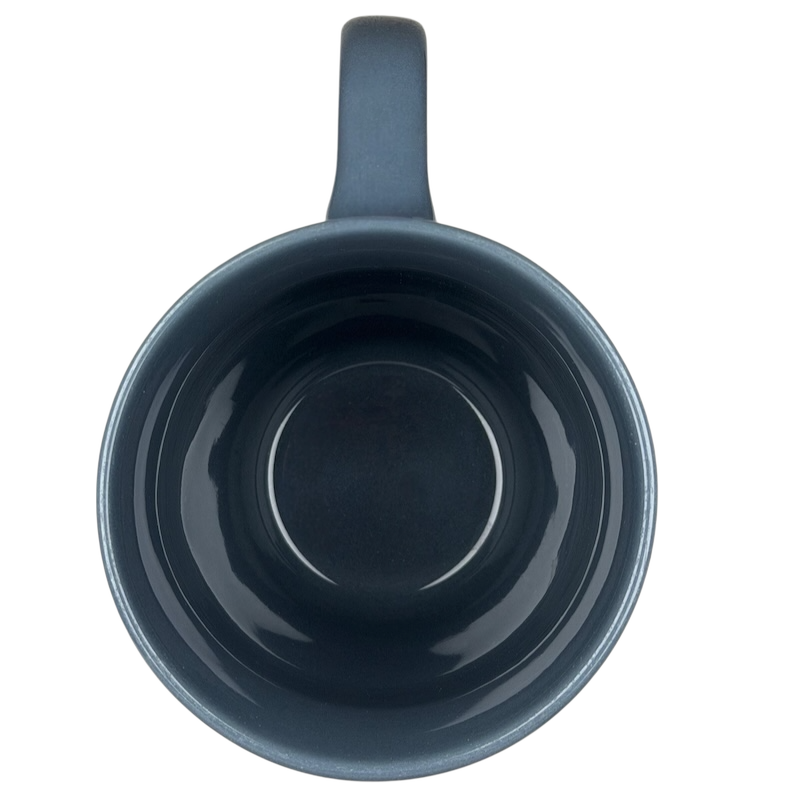 Top view of Grumpy’s Golf Course mug Disney Store in a deep blue color with a smooth finish