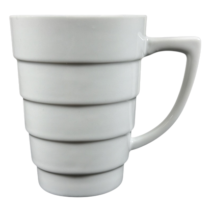Krups white ceramic Frank Lloyd Wright vintage Guggenheim mug with stepped spiral bands and angular handle
